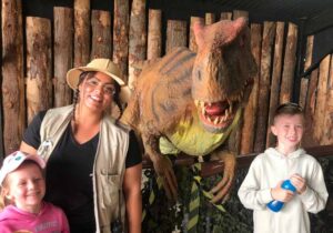 Children meeting a Dinosaur