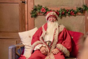 Father Christmas siting in his Grotto