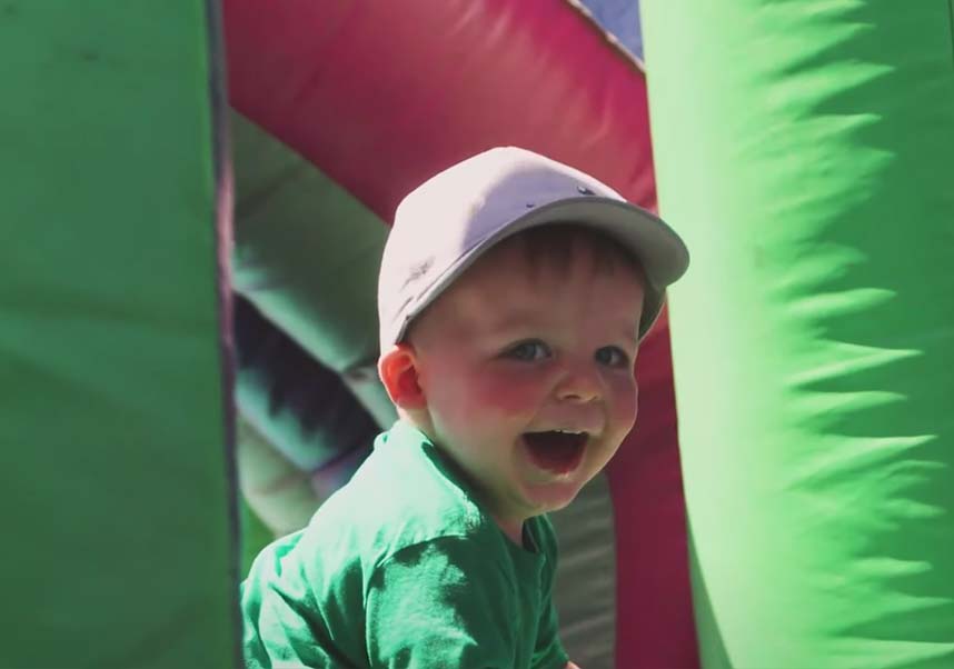Todller having fun in a bouncy castle