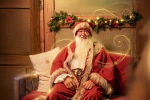 Father Christmas siting in his Grotto